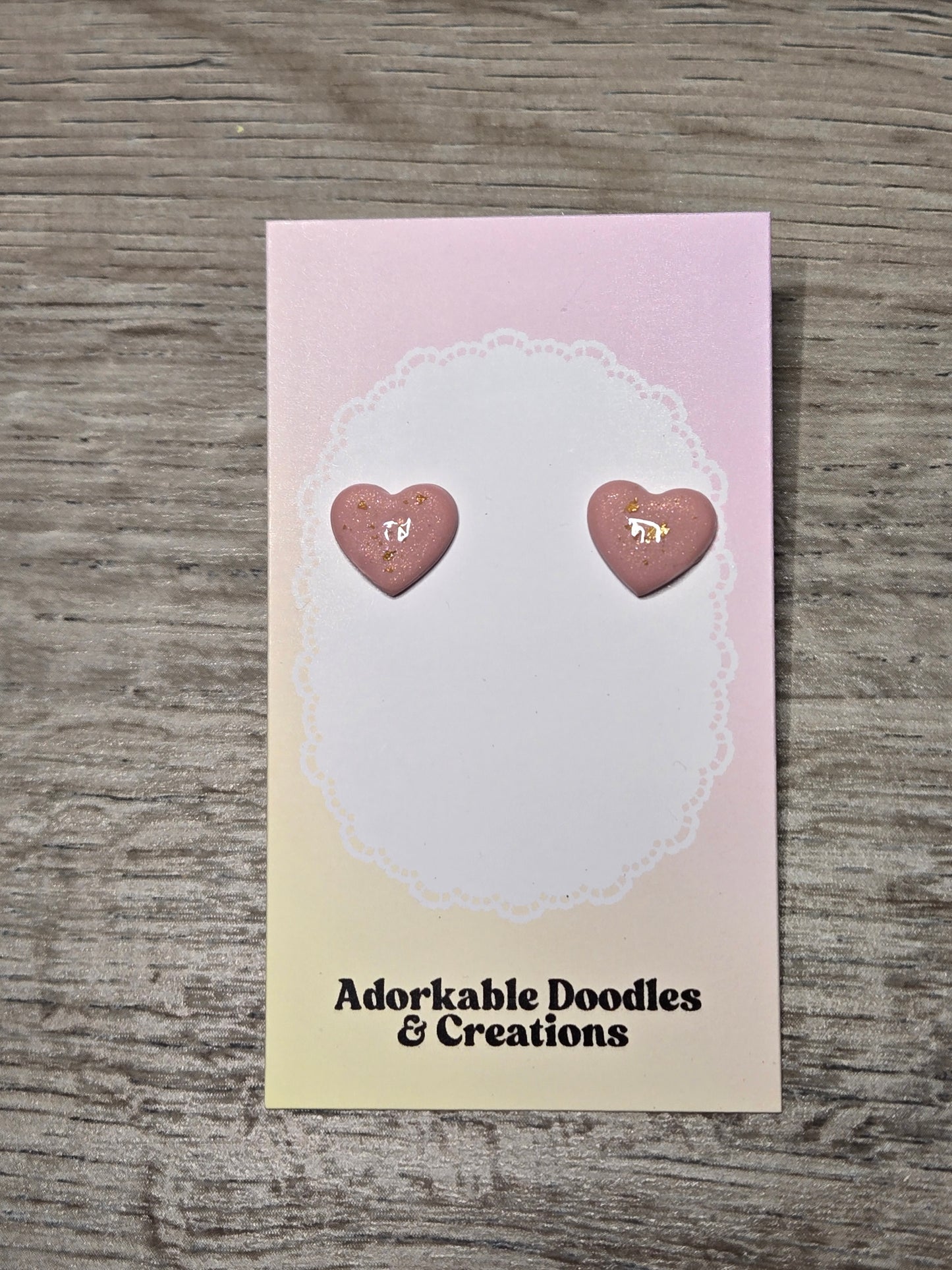Pink and gold heart studs